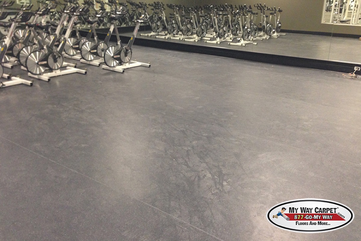 Spin-room vinyl with 6-inch black wall base